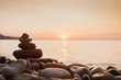 © Wingedbull - stack of zen stones on pebble beach