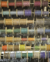 Wall Mural - colored spool of necklaces