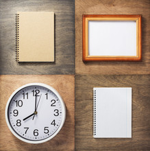 Notebook And Wall Clock At Wooden Background