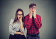 © Feodora - Scared nervous man and woman looking with widely opened mouth at camera