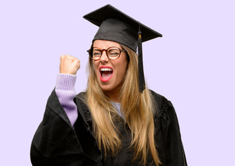 Wall Mural - Young woman university graduate student irritated and angry expressing negative emotion, annoyed with someone