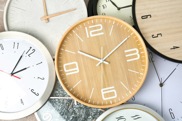 Poster - Many different clocks, top view. Time change concept
