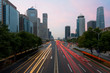 © ake1150 - Light trails on the street at Beijing Central Business district at night in Beijing ,China.