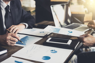 Fototapete - Business people are working in office, presentation in front of boss, businessman leader presentation to colleagues and business strategy and pointing to the graph and chart