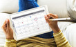 © Rawpixel.com - Woman checking calendar on digital tablet