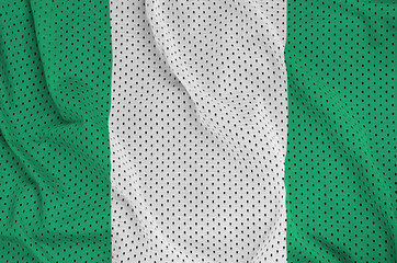 Wall Mural - Nigeria flag printed on a polyester nylon sportswear mesh fabric with some folds