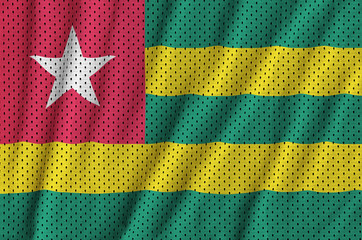 Poster - Togo flag printed on a polyester nylon sportswear mesh fabric with some folds