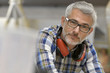 © goodluz - Portrait of wood industry worker