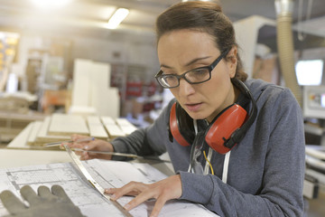 Wall Mural - Industrial designer woman working on project