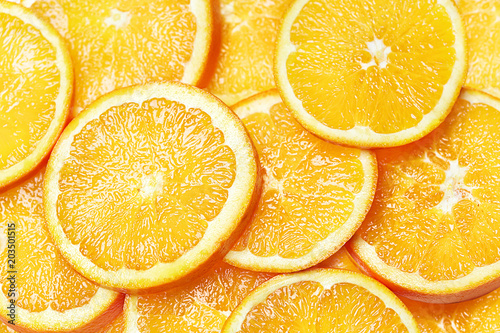 Stampe Fresh Orange Slices Background. Top View.