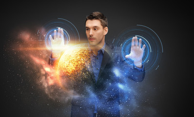 Wall Mural - business, future technology and augmented reality concept - businessman with virtual planet and space hologram