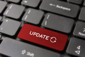 Wall Mural - web update process key concept on laptop keyboard