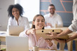 © fizkes - Delivery man giving pizza box to smiling female office worker ordered food service at work, happy millennial satisfied customer employee receiving meal from courier on corporate business lunch break