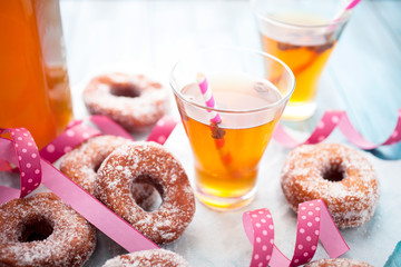 Sugar donuts and sima