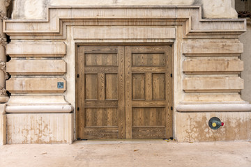 Facade of old building with wooden door