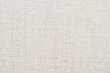 Hessian sackcloth woven texture pattern background in light white pastel beige cream color