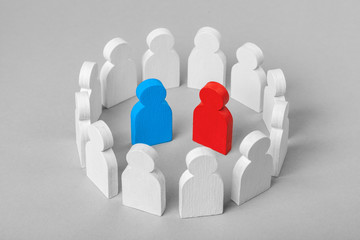 Wall Mural - Concept leader of  business team. Crowd of white men stands in  circle and listens to the blue and red speaker candidate, work with objections, conflict