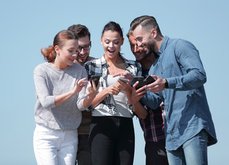 Sticker - closeup. the group of students using smartphones.