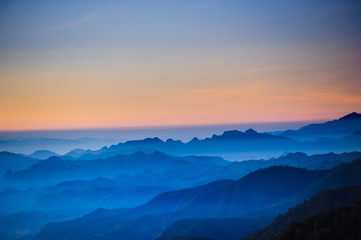 Wall Mural - night sky before sunrise in top of view of beauty blue shade mountain range in the early morning daw