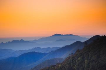 Wall Mural - beautiful mountains with shades of orange scenery in the early morning dawn.