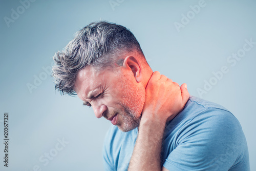 Cuadros en Lienzo Young man suffering from neck pain. Headache pain.