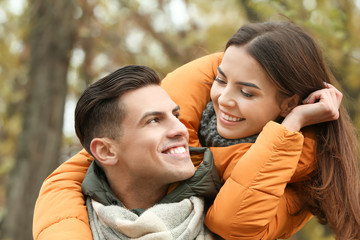 Canvas Print - Beautiful couple in warm clothes outdoors