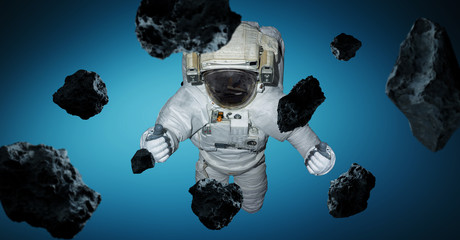 Wall Mural - astronaut isolated on blue background 3d rendering elements of this image furnished by nasa