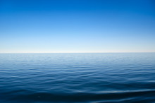 Panorama Of Sea Waves Against The Blue Sky