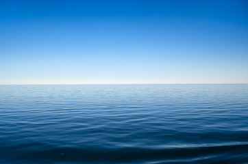 panorama of sea waves against the blue sky