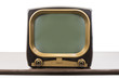 Vintage 1950s television on table isolated on white with clipping path.