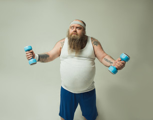 man exercising with weights