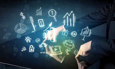 Poster - Man touching technology smart table with business icons and symbols