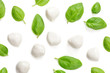 Basil and mozzarella. Food Ingredients pattern with mozarella cheese balls and fresh basil leaves, top view
