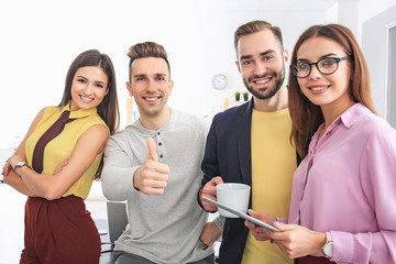 Canvas Print - Group of young business workers in office