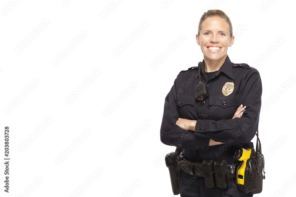 Female police officer posing with arms crossed - obrazy, fototapety, plakaty 