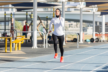 Arabian woman training outdoors