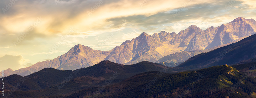 part of High Tatra mountain ridge at sunset. view from Poland side - obrazy, fototapety, plakaty 