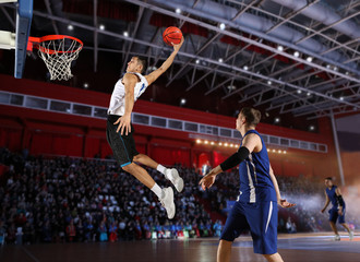 Two basketball players in action