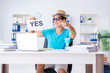 © Elnur - Businessman holding message in office