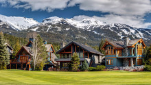 Luxury Homes On Nicklaus North Golf Course In Whistler On A Sunny Spring Day With Blackcomb Mountain In The Background. Whistler, British Columbia Canada