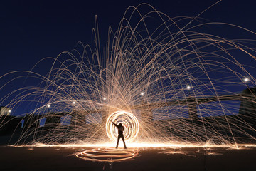 unique creative light painting with fire and tube lighting