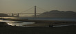 Shadows at sunset in front of Golden Gate Bridge