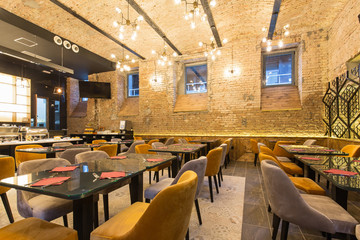 Wall Mural - Interior of a modern hotel restaurant with brick wall