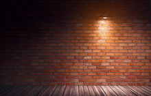 3d Rendering Illustration Of Empty Old Grungy Room With Red Brick Wall And Wooden Floor. Yellow Directional Light From Hanging Metal Lamp. Industrial Building Interior.