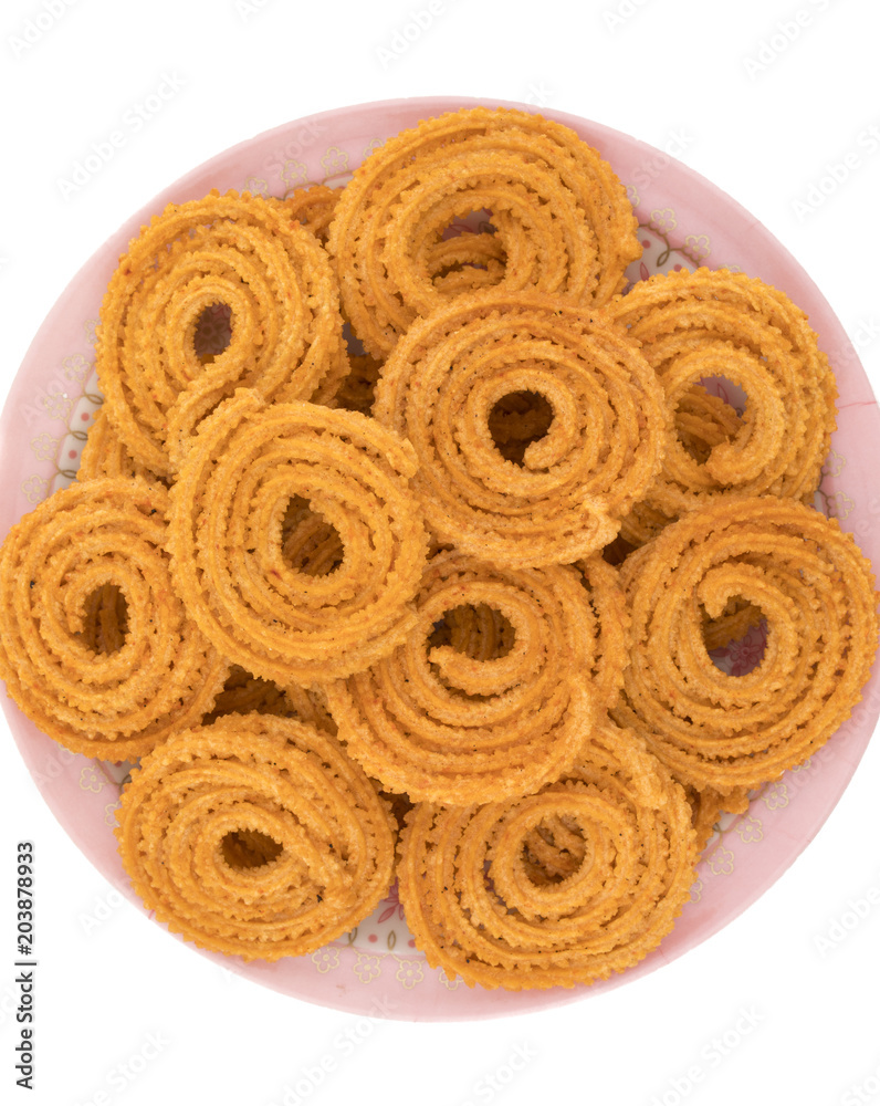 Indian Traditional Snack Chakli, a spiral shaped crisp deep fried snack ...