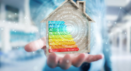 Wall Mural - businessman using 3d rendering energy rating chart in a wooden house