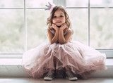 Little cute girl in dress