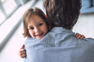 Dad with daughter at home