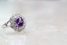 Purple Gemstone On Diamond Ring