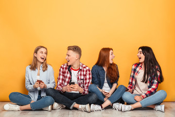 Wall Mural - Group of young happy school friends